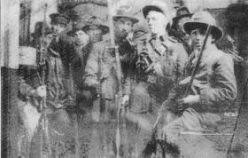 Irish Volunteers and one member of the Irish Citizen Army inside the GPO, Dublin, Easter Week, 1916. (Military Archives)