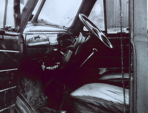 The bullet-riddled interior of the truck. (Des Long)