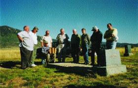 Surviving workers pay their respects at the grave of IWW organiser Frank Little, murdered by Pinkerton agents at the height of the strike. (Asylum Pictures)