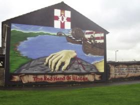 A literal (and slightly disturbing!) depiction of the origin of the Red Hand of Ulster image in a loyalist mural off Belfast’s Lower Shankill Road. Coats of arms often pun by alluding to the name of the family concerned, known as ‘the canting of arms’, and the use of distinctive Gaelic features is well represented by the heraldic emblem of the Uí Néill. According to tradition, Heremon, the third son of Milesius and first Uí Néill king of Ireland, resolved a dispute with a rival king by staging a boat race in which the winner would be the one who touched dry land first. When his opponent built up a lead, Heremon had to act fast. He drew his sword, cut off his right hand and threw it onto the shore, thereby establishing the royal line of Uí Néill descendants who ruled over large parts of Ireland for centuries. This imagery would not have been lost on Ó Maolchonaire, whose own family were hereditary genealogists and chroniclers. O’Farrell’s Linea Antigua genealogy states that Ó Maolchonaire’s family were amongst the ‘kings, nobility and gentry of Leinster, Conaght, Ulster Scotland &c. descended from Heremon, third son of Milesius of Spain’.