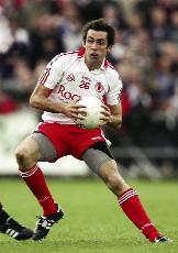 As the jersey worn by Tyrone’s Joe McMahon (in action here for 2008’s All-Ireland winning team) and the loyalist murals of the Shankill Road show, claims to the Red Hand of Ulster have been contested for centuries.