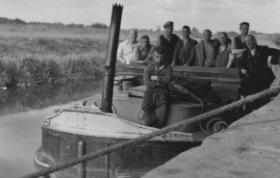 Gussy McGrath (foreground) and fellow storemen at the Guinness warehouse at Limerick Harbour Canal c. 1950.