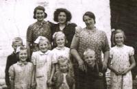 Photograph, taken by JFK himself on his first visit to Ireland in 1947, of Mary Ryan (right) and family at the ancestral homestead in Dunganstown, Co. Wexford. (Patrick Grennan)