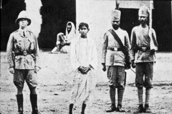 Bengali revolutionary Khudiram Bose under guard. He was executed in 1908 for the murder of two Englishwomen with a homemade bomb, the first assassination carried out by Bengali revolutionaries. His intended target was an unpopular district magistrate.