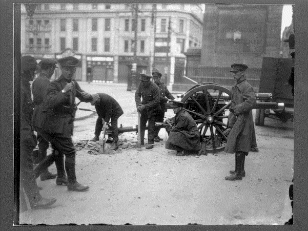 Three pictures (almost certainly taken within minutes of each other) of a National Army artillery position at the end of Henry Street (Nelson's Pillar in the background, the boarded up GPO to the right). IRA forces under the command of Oscar Traynor had taken up positions on the far (east) side of Sackville Street at the outbreak of hostilities, June 1922.