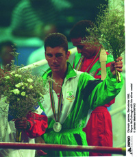 Boxer Wayne McCullough from Belfast's Shankill Road area wins a silver medal for Ireland at the 1992 Barcelona Olympics. (James Meeham/INPHO)