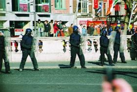 Gardaí in riot gear on O’Connell Bridge, 26 February 2006. (Nick Divers)