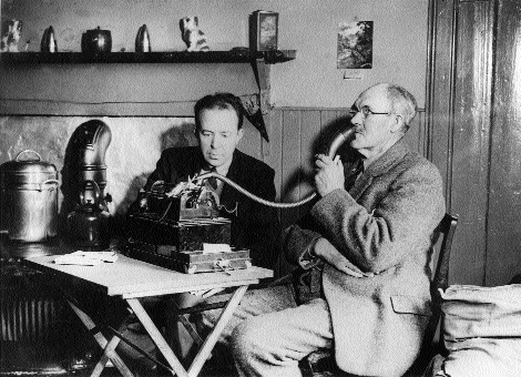 Colum Mac Gille Eathain recording Aongus MacMillan, Benbecula, Scotland, 1947.