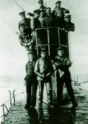 Sir Roger Casement (bare-headed) on board the German submarine U19-‘That the Sinn Féin insurrection was so quickly put down . . . must be ascribed to the fortunate arrest of Sir R. Casement and the failure of the German ship to land the required arms and ammunition'. (George Morrison)