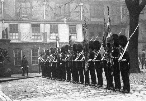 Laying up the colours of the Royal Munster Fusiliers service battalions at the Tower of London, 15 February 1923. (Imperial War Museum)