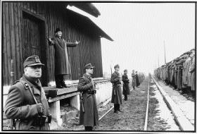 Oskar Schlinder (Liam Neeson) welcomes his workers to the safety of his new factory at Brinnlitz—‘The surviving Schlindler community governed how this book [Schlinder’s Ark] should be written.’ (Universal Pictures)