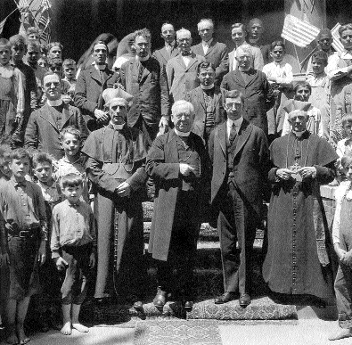 Fr Flanagan (extreme left) in a group photograph with de Valera when he visited Boys' Town in the course of his 1920 American tour. Note the black boy (top right-hand corner). Boys' Town's racial mix demonstrated the radical nature of Flanagan's project. (Hall of History, Boys' Town)