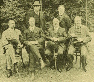 Stanford (far right) with Hubert Parry, Alexander Mackenzie, Edward German, Edward Elgar and Dan Godfrey at Bournemouth, 1910.