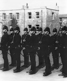 RIC constables drilling with fixed bayonets c. 1920. By late spring 1920 the RIC became an even more militarised body, with heavier weapons and equipment. (Garda Archives)