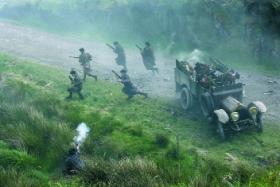 An ambush scene from Ken Loach’s The wind that shakes the barley (2006). Dan Keating, a participant in many such ambushes himself, gave his imprimatur to the film. A copy of the screenplay, given to him by writer Paul Laverty after the premiere, would be among the offertory gifts at his funeral. (Pathé Films)