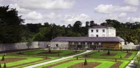 Oldbridge House, with the centre’s tea pavilion and garden in the foreground.