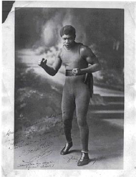 Light heavyweight champion Louis M’Barick Fall from Senegal, a.k.a. ‘Battling Siki’. He later succumbed to alcoholism before being murdered in New York in 1925.