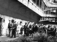 Former prisoner Seamus Brennan (second from left)—under sentence of death in 1916—leading a site inspection by the provisional restoration committee in May 1960. (Kilmainham Gaol)