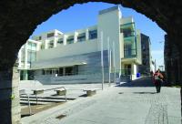 Galway City Museum—housed in a brand-new, purpose-built, two-storey edifice, which, although out of keeping with the Spanish Arch in the foreground, is historical in being a monument to that extinct creature the Celtic Tiger. (Galway City Museum)