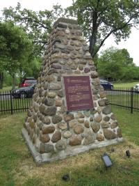 The battlefield site is curiously anonymous. The distinguishing feature is the stone cairn dedicated to the Canadian dead of June 1866.