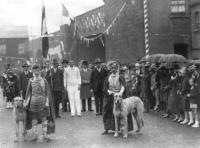 The parade from the 1928 Tailteann games at Croke Park. NACA president J.J. Keane is in the centre of the picture (to the left of the right-hand wolfhound-handler). When in 1924 he agreed to drop the NACA’s rule (inherited from the GAA) excluding British servicemen and police from membership and accepted a compromise on Sunday competitions, the Northern clubs accepted unity—but not for long. (Cyril White)