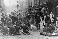 Children celebrating the end of the war with the Stars and Stripes, the acceptable face of Allied victory. America was the receptacle of hope for international recognition at the Peace Conference. (Bettmann/Corbis)