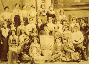 Members of Inghinidhe na hÉireann. Helena Molony is seated third from left, second row, beside Maud Gonne (holding the banner). ‘I was a young girl dreaming about Ireland when I saw and heard Maud Gonne speaking by the Custom House in Dublin one August evening in 1903 . . . She electrified me and filled me with some of her own spirit.’ 