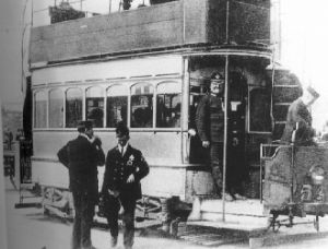 Above: A DMP constable guarding a tram during the Lockout. (Garda Museum)