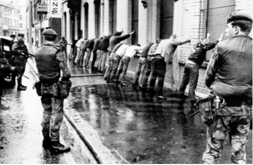 A random British Army search operation in Belfast c. 1971. Kitson proposed a ‘chain reaction system’ of intelligence-gathering whereby the accumulation of masses of low-grade ‘background intelligence’ would generate ‘contact information’, which would then expose the enemy for elimination. (An Phoblacht)