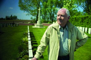 Gay Byrne at Lone Tree Cemetery in West-Flanders—mostly containing the graves of soldiers of the Royal Irish Rifles killed on the first day of the Battle of Messines in June 1917