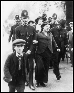 Arrested when protesting at Buckingham Palace, Metge (between two officers in the rear of the picture) was shocked at the way the police treated the suffragettes.