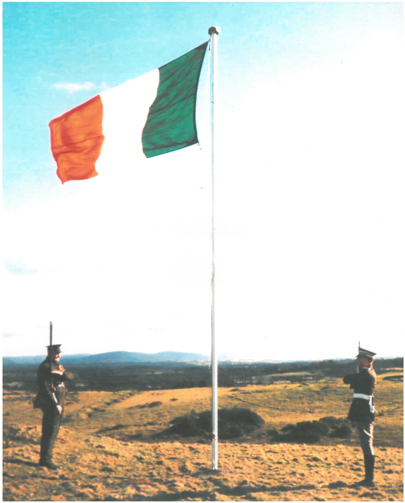 Saluting the flag. The photograph shows Volunteer Sean O’Duffy and Cadet Frank Russell saluting the National Flag at the Curragh in Easter 1966. Volunteer O’Duffy was wearing the uniform he wore on active service in Easter Week, 1916. (Photo: National Library of Ireland) 