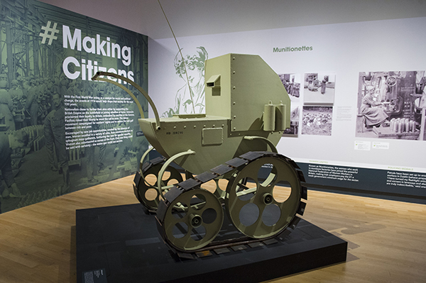 Above: ‘Armoured Pram for Derry’ by Eamon O’Doherty, one of several contemporary art installations on the theme of war and violence. On the wall behind are panels on the ‘Munitionettes’, women employed in munitions manufacture.